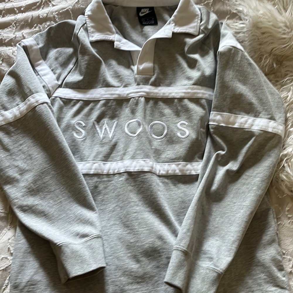 Gray Nike swoosh, rugby shirt